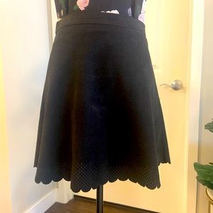 Suede skirt with scalloped edges